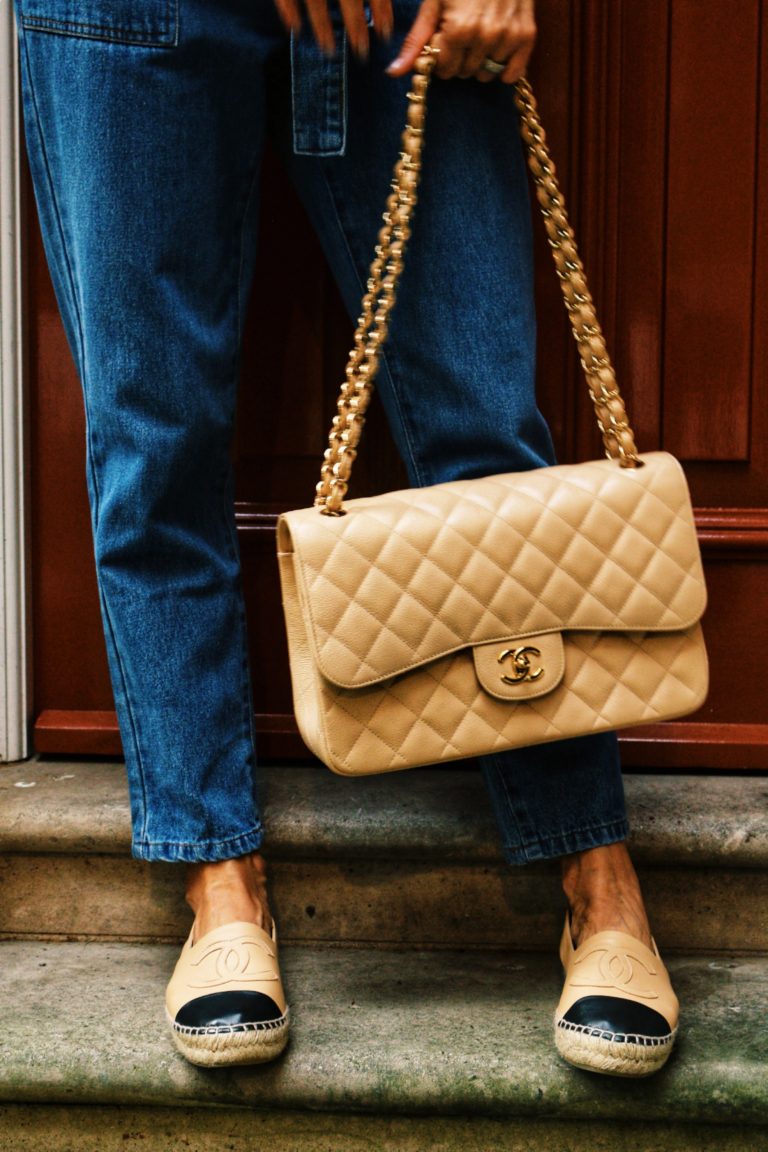 Close up on the shoes and Chanel bag